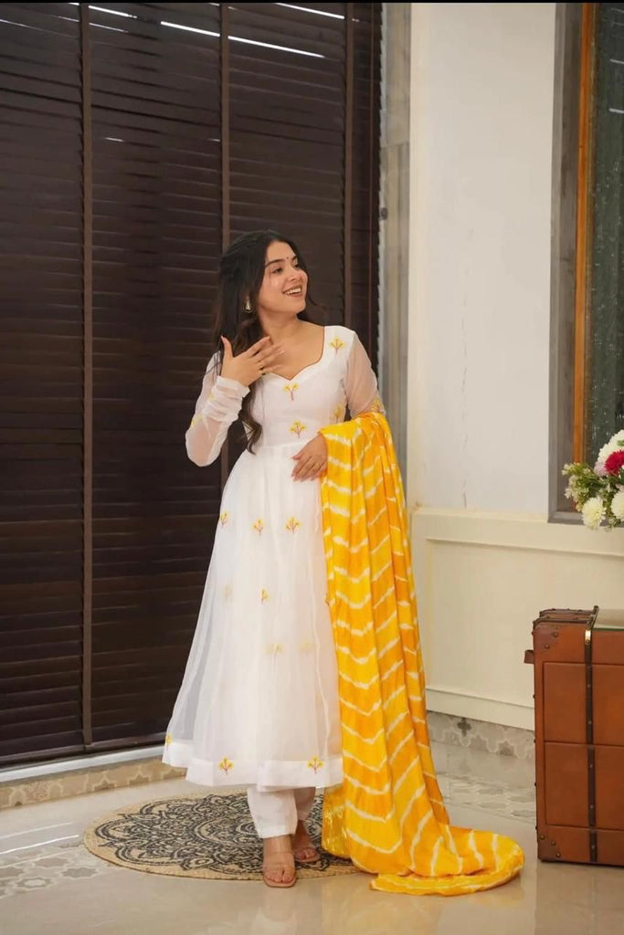 Yellow & White Celebrate Elegance with Our Exclusive Two-Color Anarkali Design ClothsVilla