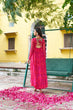 Load image into Gallery viewer, Pink Bandhani Print Faux Georgette Gown with Kutchi Patchwork – Full Sleeves, 9 Meter Flair, Cotton Lining ClothsVilla