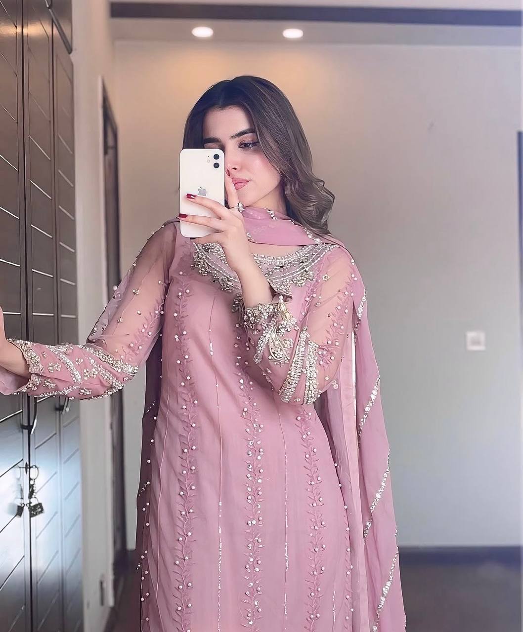Pink Elegant Faux Georgette Embroidered Plazzo Set with Rivet Moti & Fancy Latkan Detailing ClothsVilla