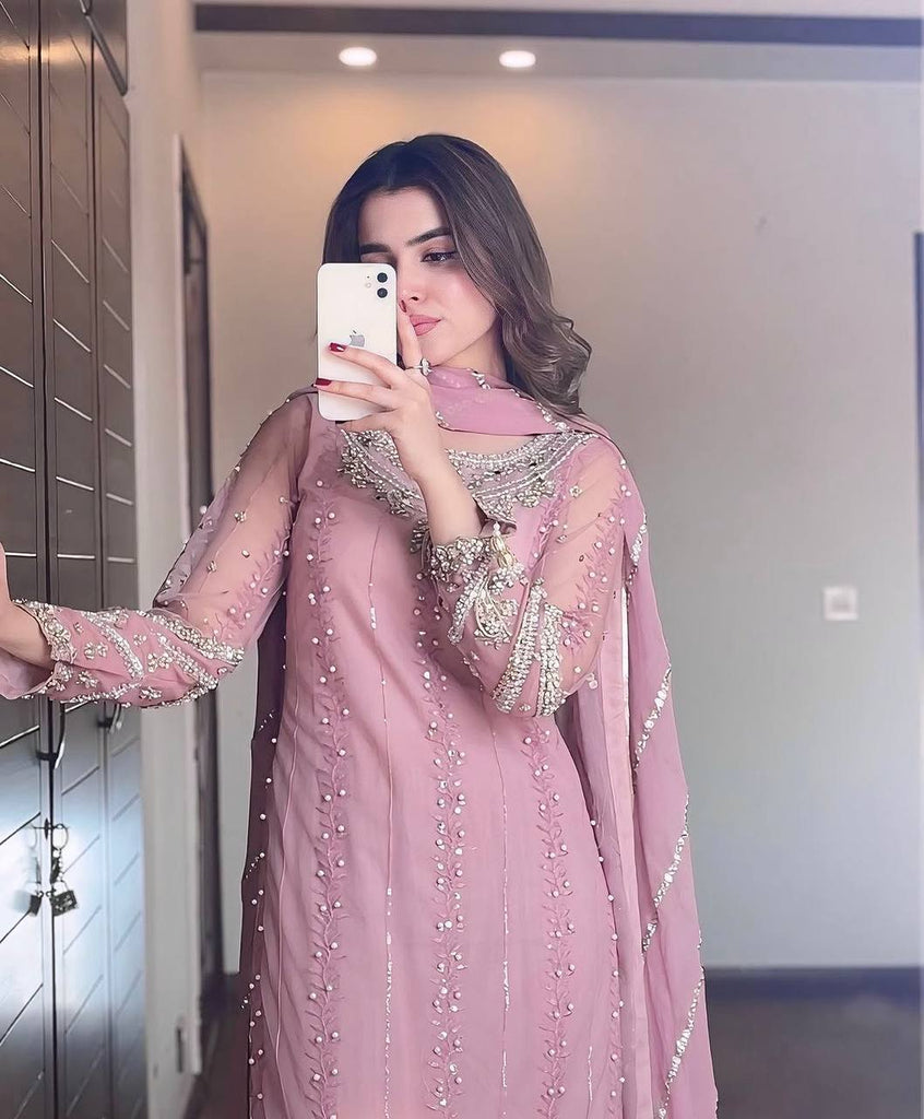 Pink Elegant Faux Georgette Embroidered Plazzo Set with Rivet Moti & Fancy Latkan Detailing ClothsVilla