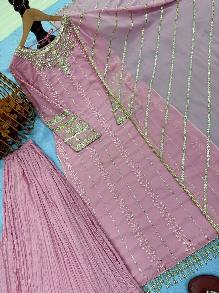Pink Elegant Faux Georgette Embroidered Plazzo Set with Rivet Moti & Fancy Latkan Detailing ClothsVilla