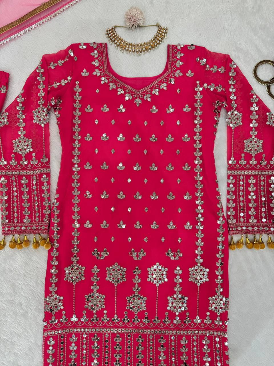 Pink Elegant Faux Georgette Sharara Set with Butterfly Net Dupatta Clothsvilla