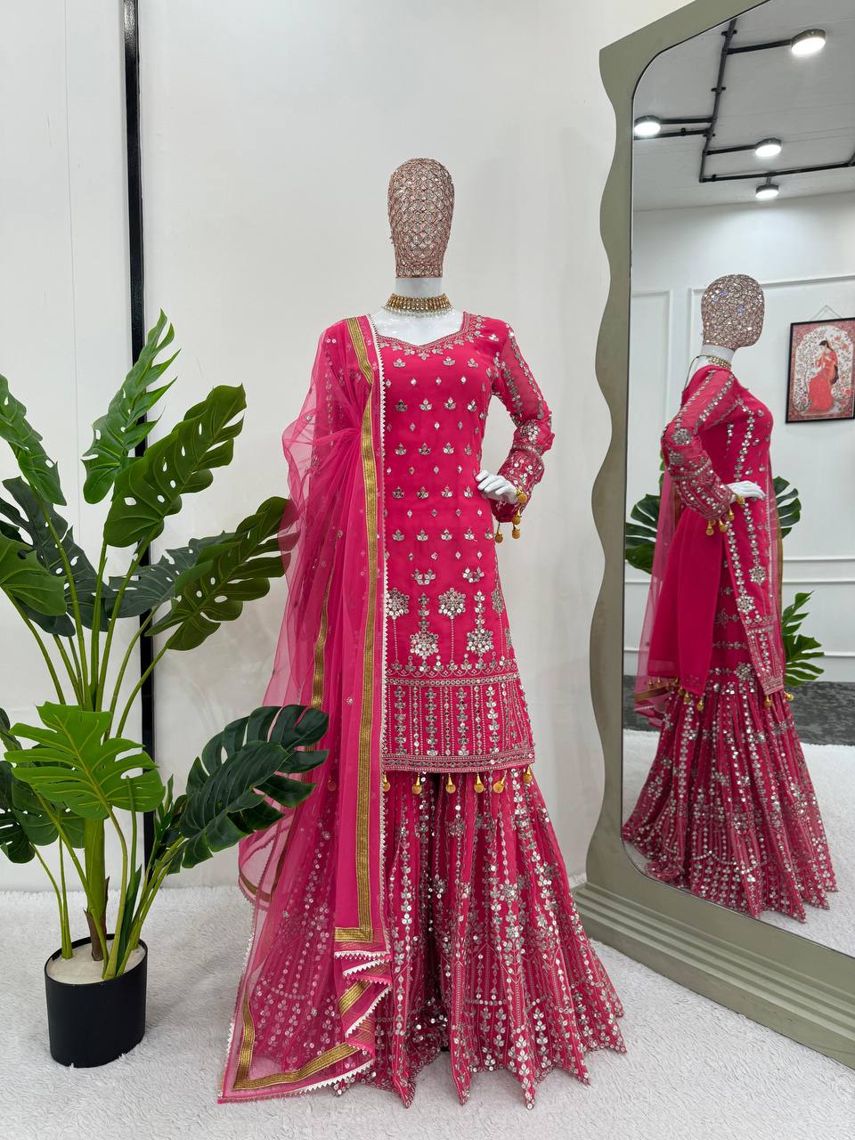 Pink Elegant Faux Georgette Sharara Set with Butterfly Net Dupatta Clothsvilla