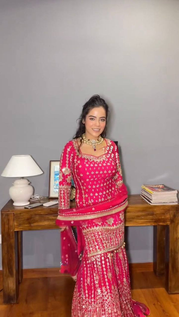 Pink Elegant Faux Georgette Sharara Set with Butterfly Net Dupatta Clothsvilla