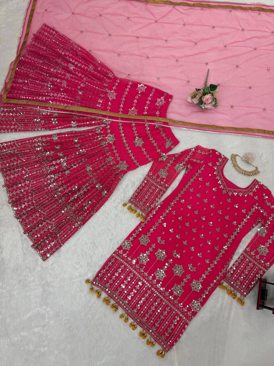 Pink Elegant Faux Georgette Sharara Set with Butterfly Net Dupatta Clothsvilla