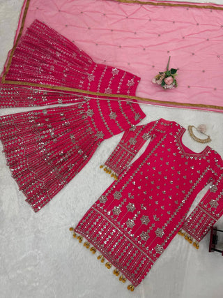 Pink Elegant Faux Georgette Sharara Set with Butterfly Net Dupatta Clothsvilla