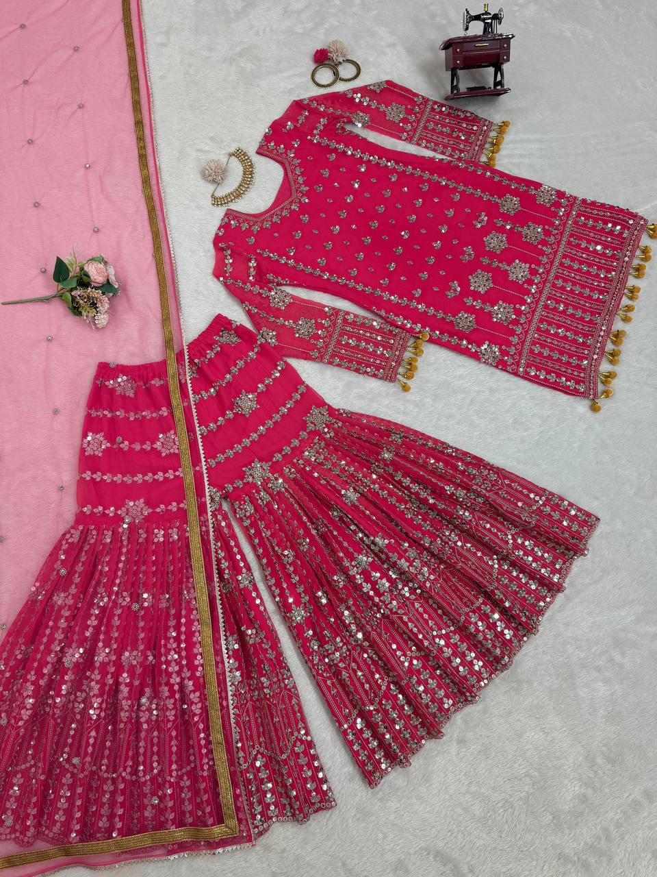 Pink Elegant Faux Georgette Sharara Set with Butterfly Net Dupatta Clothsvilla