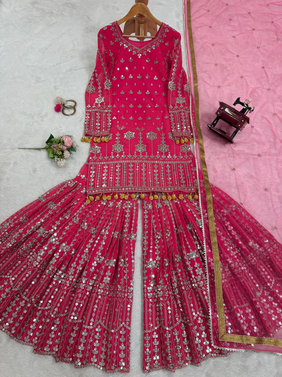 Pink Elegant Faux Georgette Sharara Set with Butterfly Net Dupatta Clothsvilla