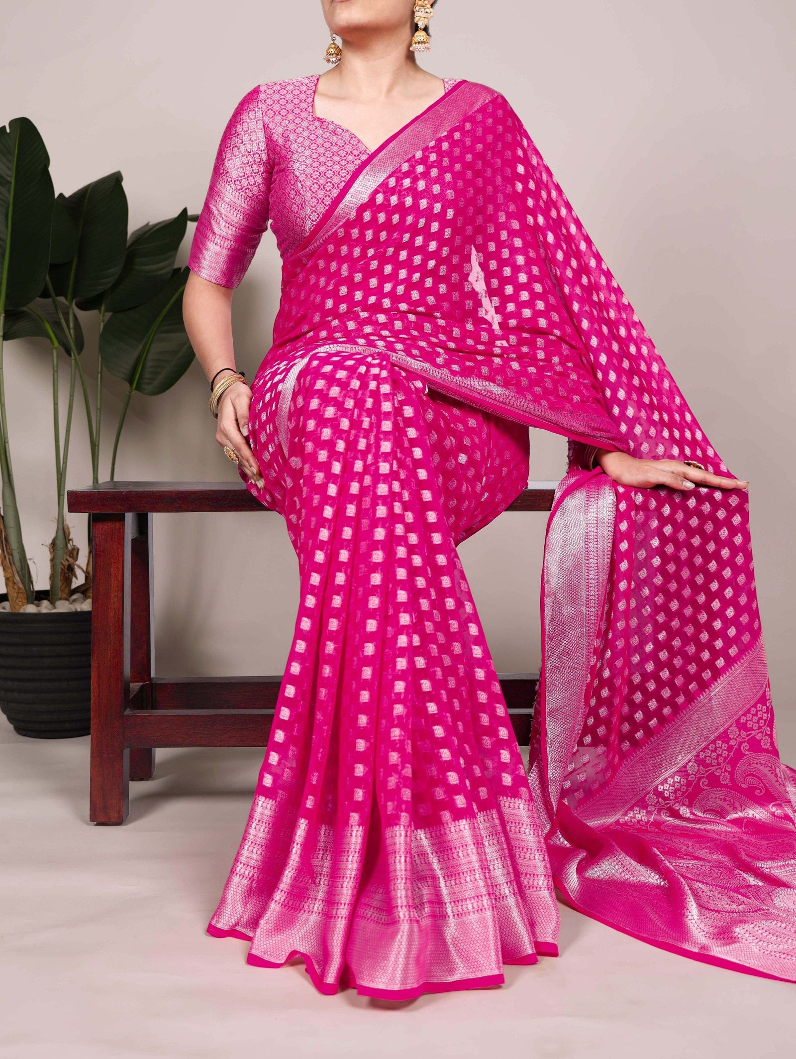 Pink Elegant Nylon Georgette Saree with Zari Weaving & Viscose Border ClothsVilla