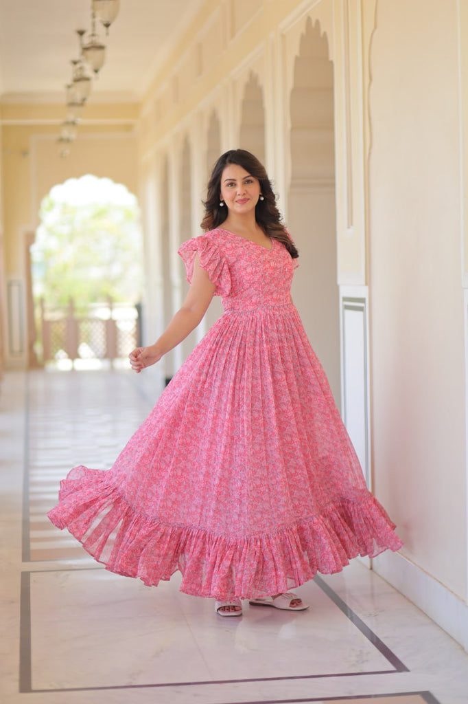 Pink Elegant Printed Faux Georgette Gown with Bell Sleeves & V-Neck Clothsvilla