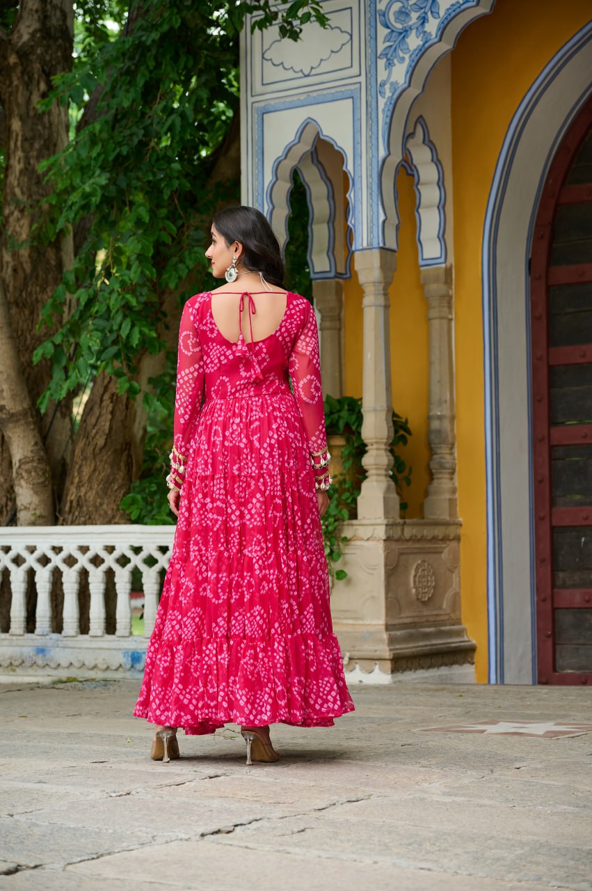 Pink Faux Georgette Bandhani Print Gown with Kutchi Patchwork – Full Sleeves, 12 Meter Flair, Cotton Lining ClothsVilla