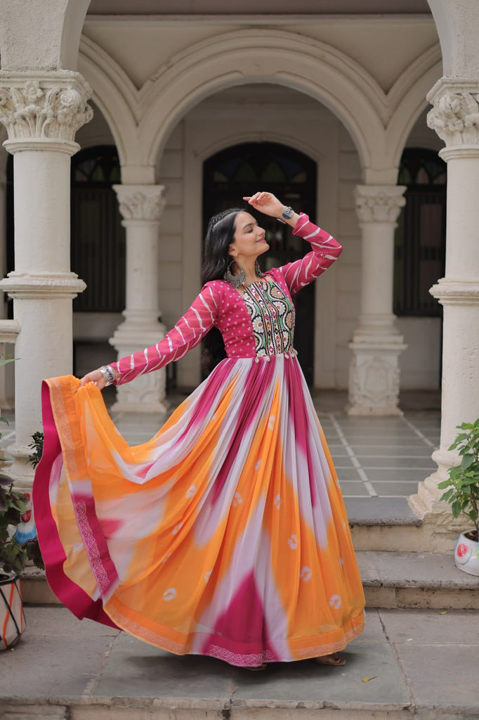 Pink Faux Georgette Bandhej Print Gown with Gamthi Embroidery & Mirror Work ClothsVilla