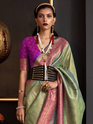 Pista Elegant Banarasi Silk Blend Woven Saree with Tassel Detailing ClothsVilla