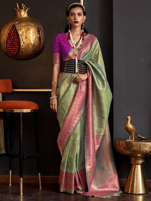Pista Elegant Banarasi Silk Blend Woven Saree with Tassel Detailing ClothsVilla