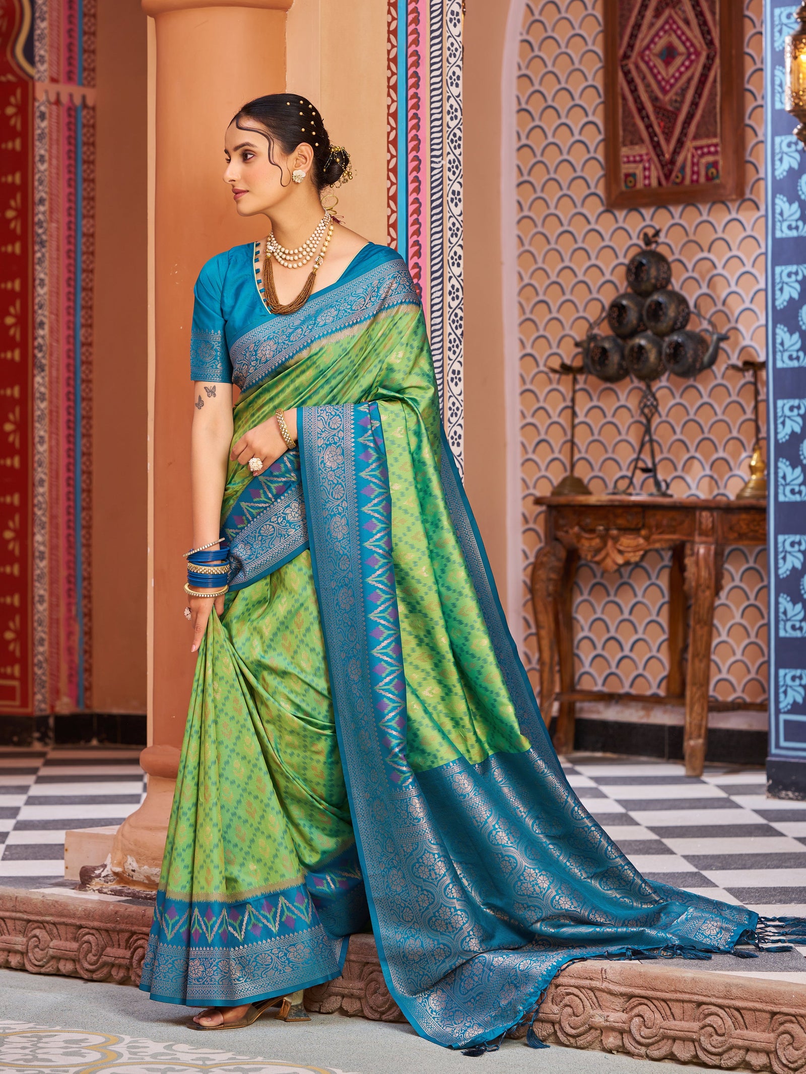 Pista Elegant Banarasi Tissue Silk Saree with Zari Woven Design ClothsVilla