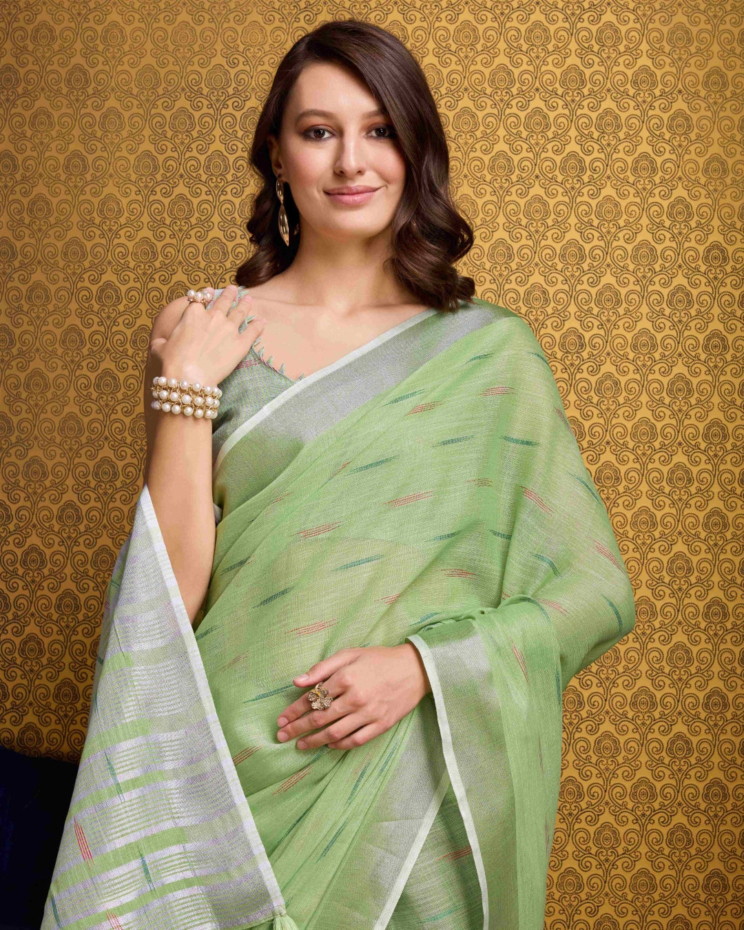 Pista Elegant & Gold-Toned Ikat Woven Saree with Zari Border ClothsVilla