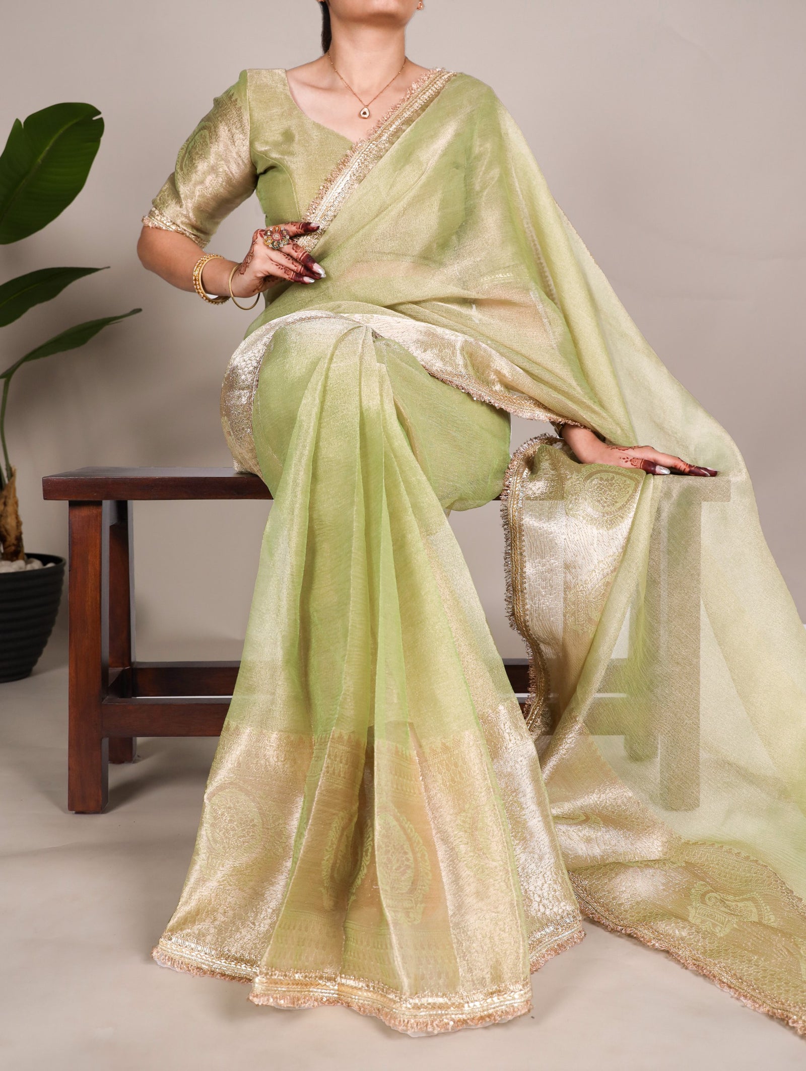 Pista Elegant Tissue Shimmer Saree with Zari Weaving and Sequins Lace Border