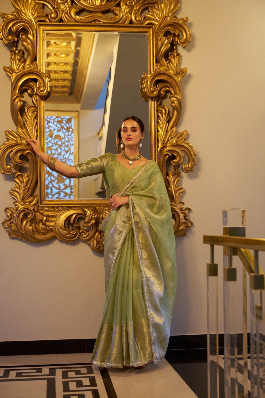 Pista Elegant Tissue Shimmer Saree with Zari Weaving and Sequins Lace Border ClothsVilla