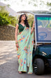 Load image into Gallery viewer, Pista Graceful Weightless Marble Saree with Floral Print &amp; Pearl Lace Border – Includes Banglory Blouse Piece ClothsVilla