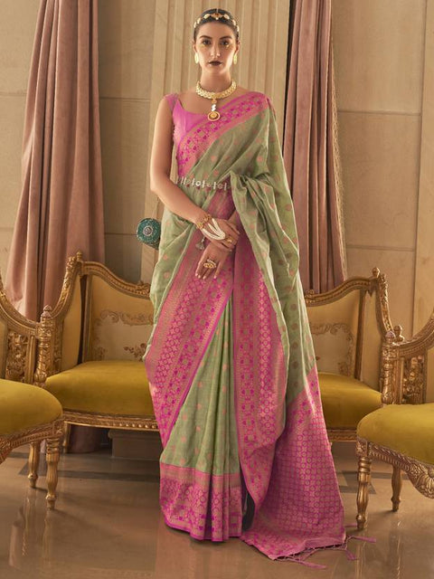 Pista Graceful Woven Banarasi Silk Blend Saree with Tassel Detailing ClothsVilla Main image
