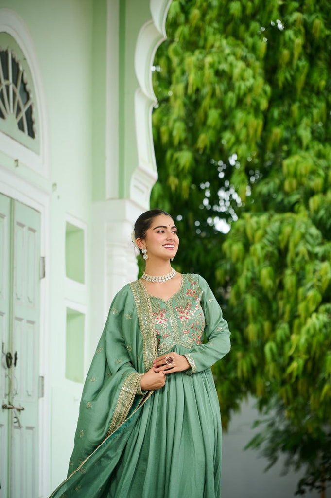 Pista Green Elegant Vichitra Silk Gown with Rich Zari & Thread Embroidery and Dupatta – Designer Full-Sleeve Frill Gown ClothsVilla