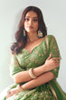 Load image into Gallery viewer, Pista Green Graceful  Butterfly Net Lehenga with Exquisite Embroidery