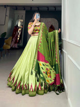 Load image into Gallery viewer, Luxurious Pista Green Printed Tussar Silk Lehenga Choli with Foil Work - Set of 3 ClothsVilla