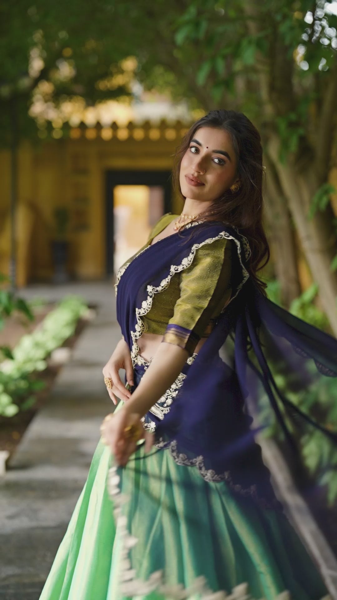 Pista Green Kanchipuram Zari Weaving Lehenga with Navy Blue Embroidered Georgette Dupatta