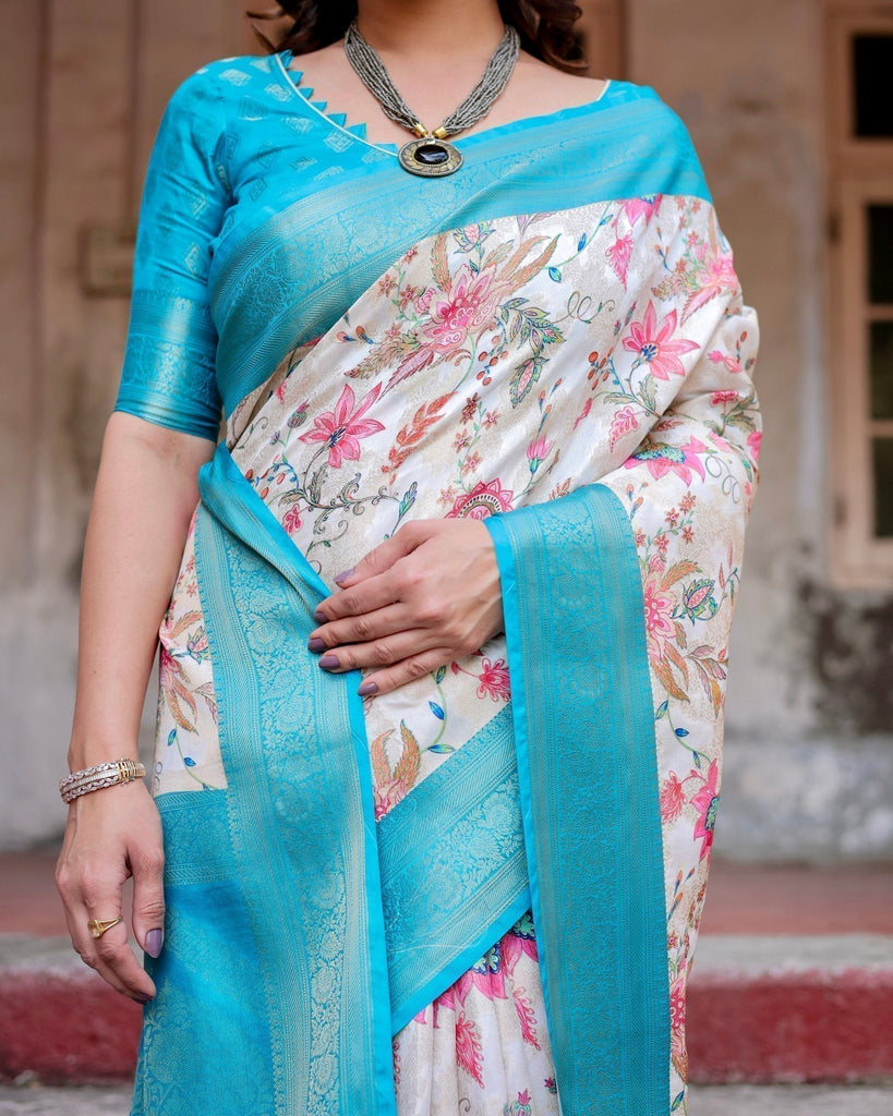 White and Aqua Floral Design Banarasi Silk Saree with Zari Weave and Tassel-Embellished Pallu BANARASI PRINTED