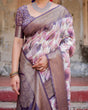 Load image into Gallery viewer, Elegant Purple Floral Banarasi Silk Saree with Intricate Zari Weave and Tassels BANARASI PRINTED