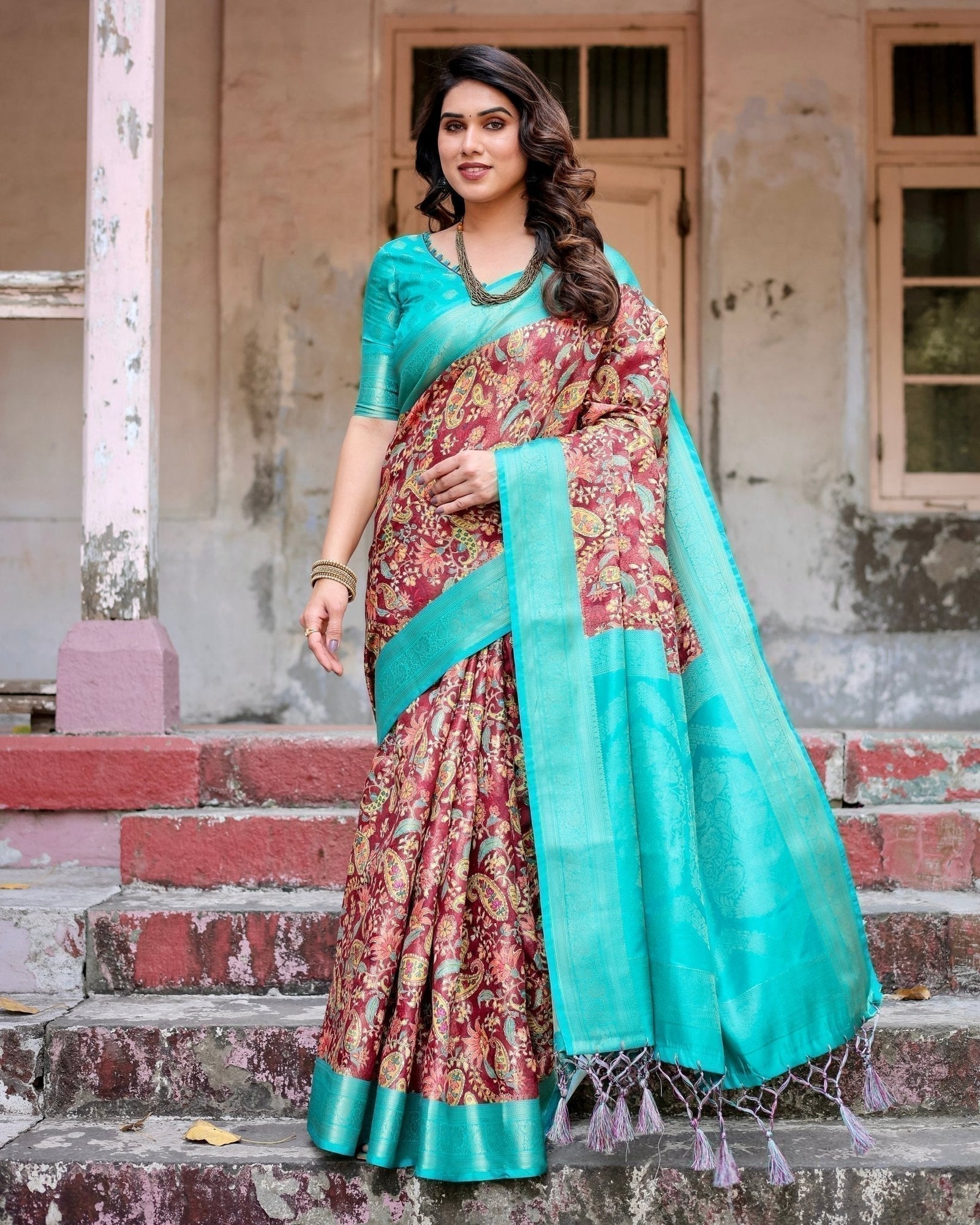 Maroon and Teal Paisley Design Banarasi Silk Saree with Zari Weave and Tassel-Embellished Pallu BANARASI PRINTED