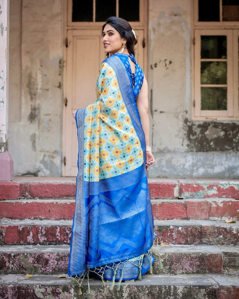 Yellow and Blue Ikat Digital Print Banarasi Silk Saree with Zari Weave and Tassel-Embellished Pallu BANARASI PRINTED