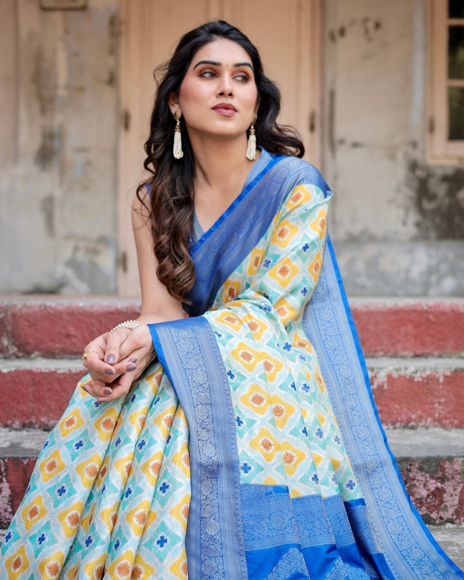 Yellow and Blue Ikat Digital Print Banarasi Silk Saree with Zari Weave and Tassel-Embellished Pallu BANARASI PRINTED