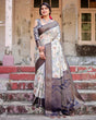 Load image into Gallery viewer, Elegant Gray Banarasi Silk Saree with Navy Blue Zari Weave, Floral Design, and Tassels BANARASI PRINTED
