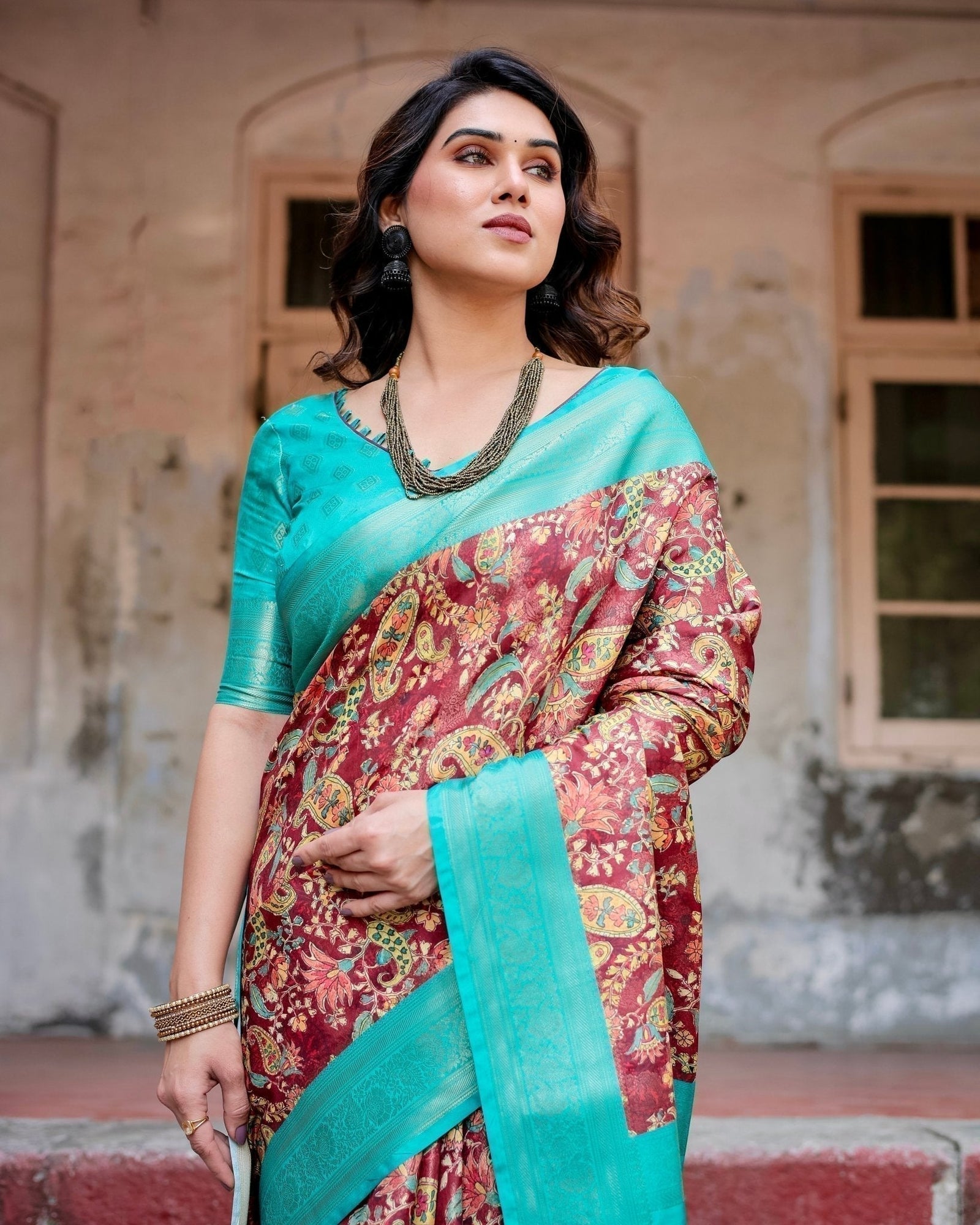 Maroon and Teal Paisley Design Banarasi Silk Saree with Zari Weave and Tassel-Embellished Pallu BANARASI PRINTED