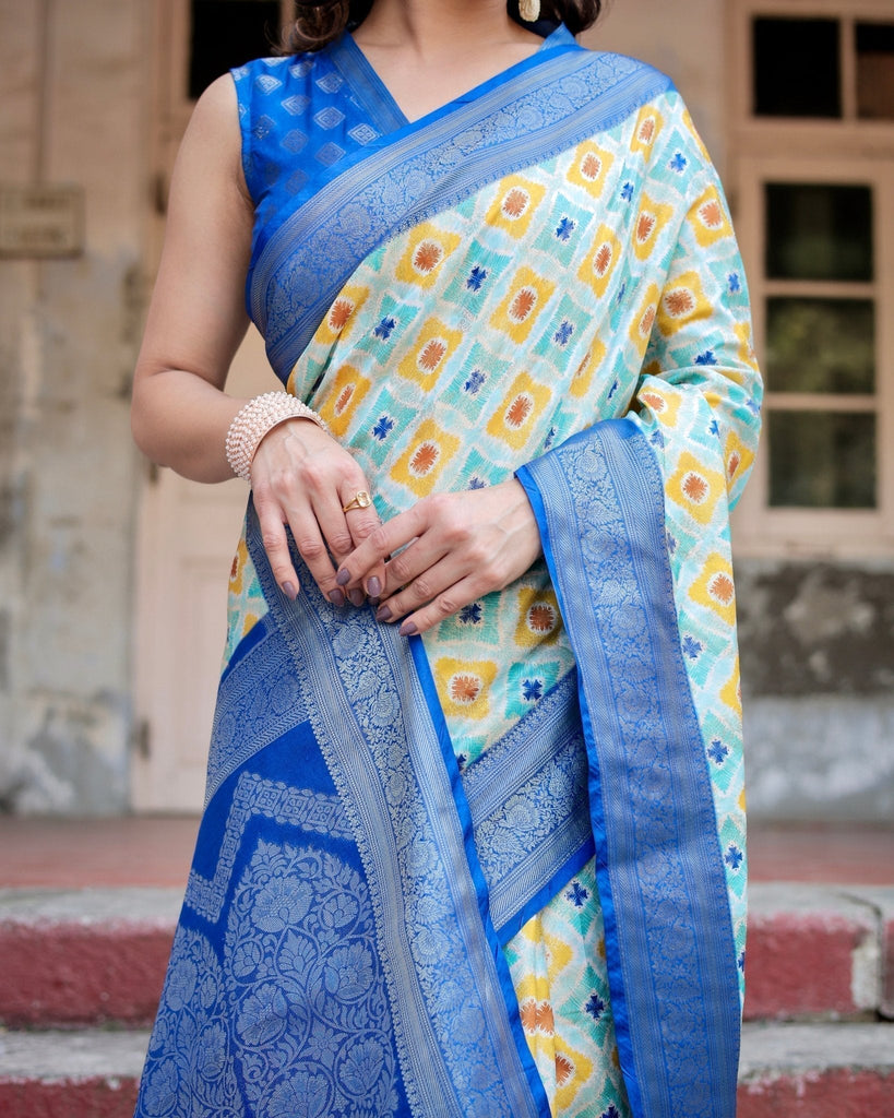 Yellow and Blue Ikat Digital Print Banarasi Silk Saree with Zari Weave and Tassel-Embellished Pallu BANARASI PRINTED