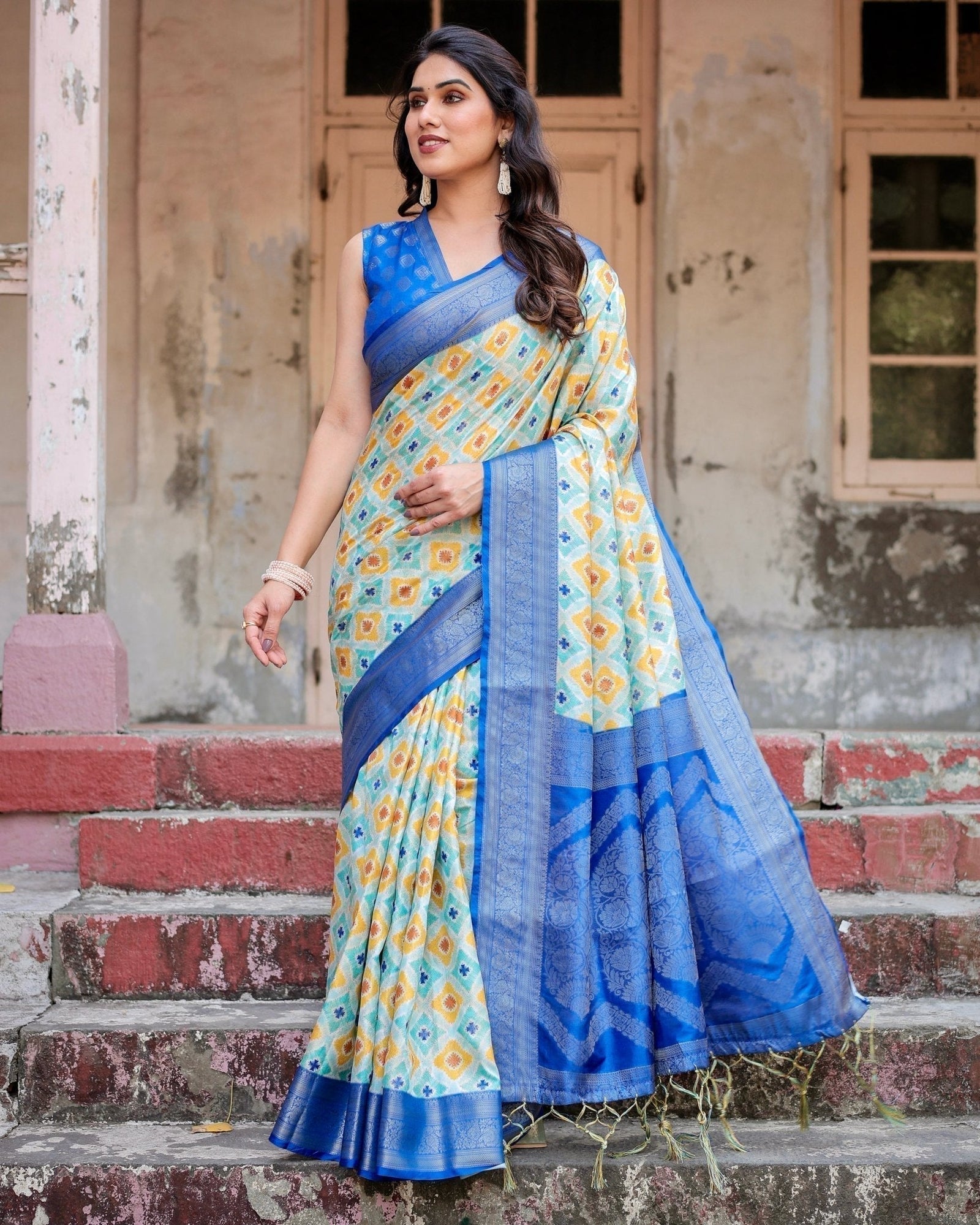 Yellow and Blue Ikat Digital Print Banarasi Silk Saree with Zari Weave and Tassel-Embellished Pallu BANARASI PRINTED