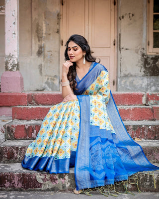 Yellow and Blue Ikat Digital Print Banarasi Silk Saree with Zari Weave and Tassel-Embellished Pallu BANARASI PRINTED