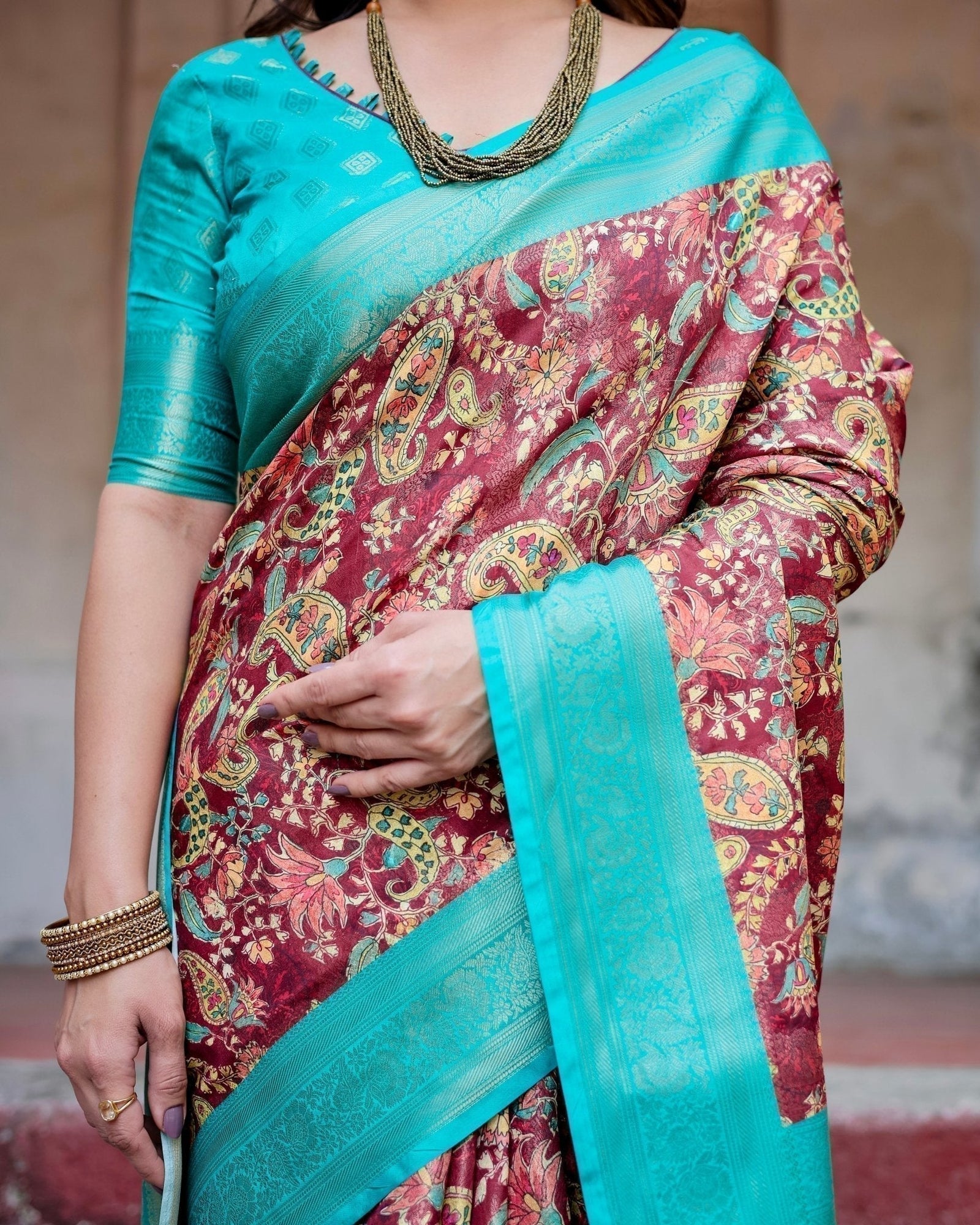 Maroon and Teal Paisley Design Banarasi Silk Saree with Zari Weave and Tassel-Embellished Pallu BANARASI PRINTED