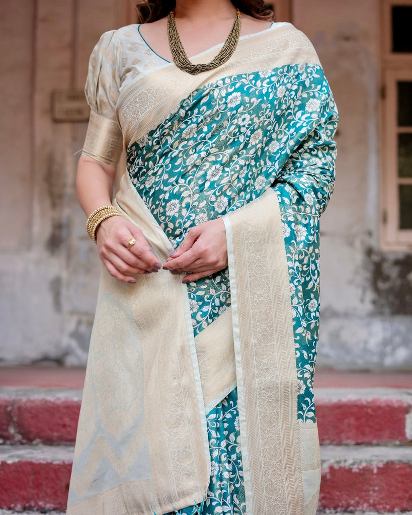 Teal and Cream Floral Banarasi Silk Saree with Zari Weave and Tassel-Accented Pallu BANARASI PRINTED