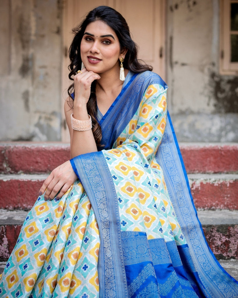 Yellow and Blue Ikat Digital Print Banarasi Silk Saree with Zari Weave and Tassel-Embellished Pallu BANARASI PRINTED