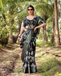Load image into Gallery viewer, Elegant Black Tussar Silk Saree with Zari Embellished Border and Bold Floral Pallu DIGITAL PRINT