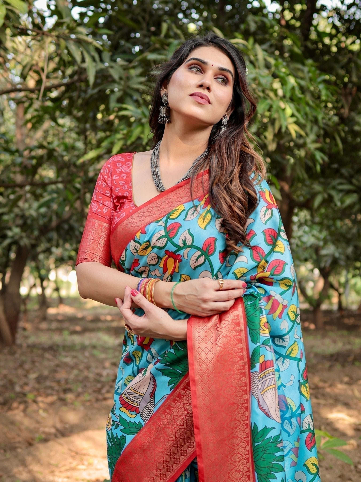 Aqua Blue Tussar Silk Saree with Vibrant Nature-Inspired Prints and Red Zari Border DIGITAL PRINT