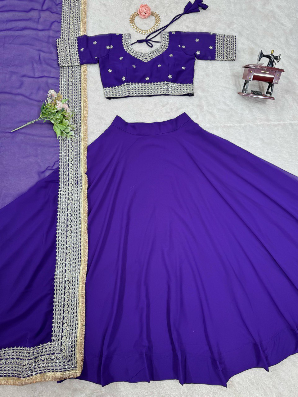 Purple Designer Faux Georgette Semi-Stitched Lehenga Choli with Sequin Embroidery & Butterfly Net Dupatta ClothsVilla