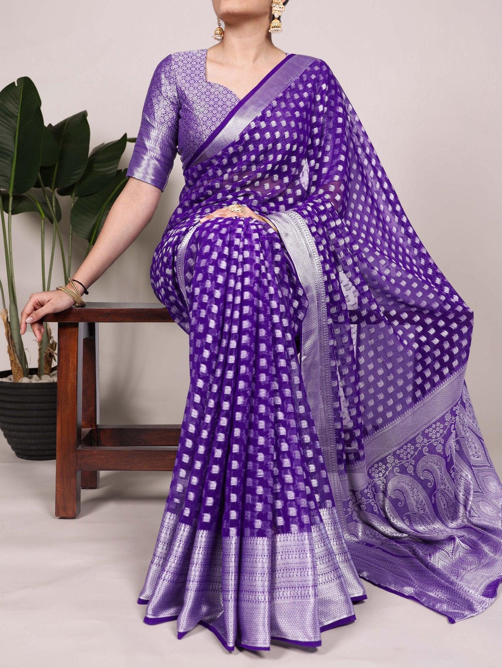 Purple Elegant Nylon Georgette Saree with Zari Weaving & Viscose Border ClothsVilla