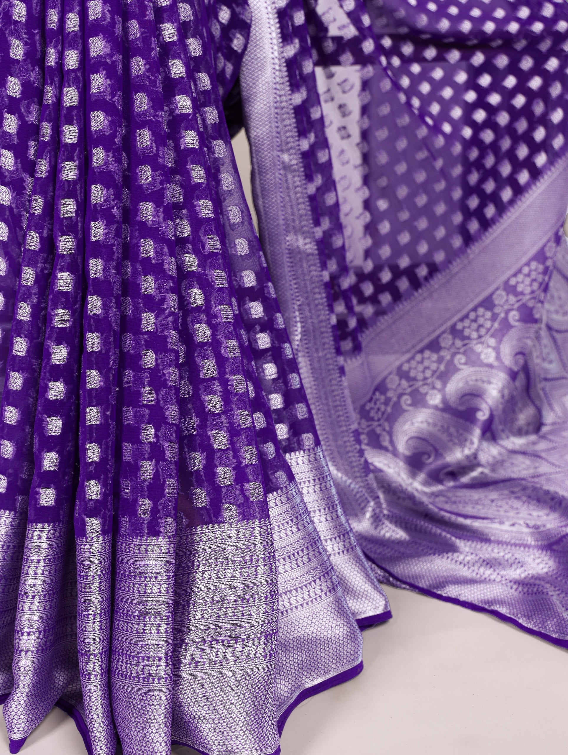 Purple Elegant Nylon Georgette Saree with Zari Weaving & Viscose Border ClothsVilla