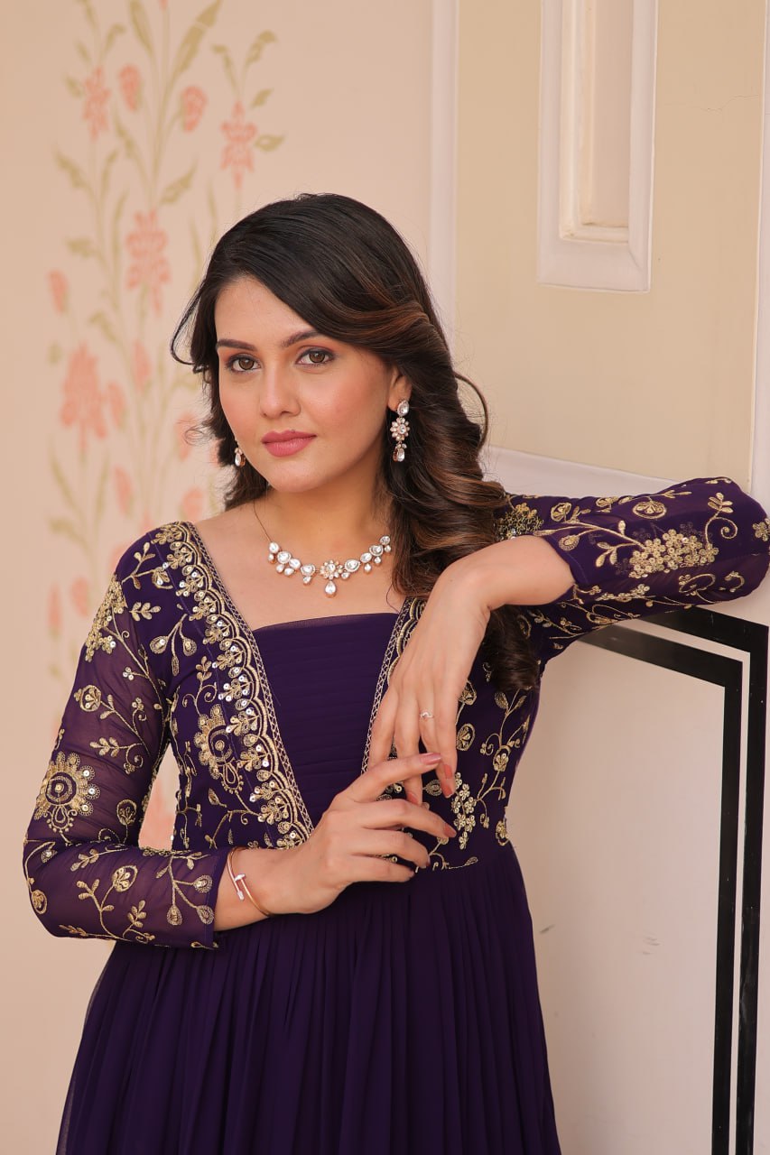 Purple Faux Blooming Fabric Embroidered Gown with 12-Meter Flair & Fancy V-Neck Design ClothsVilla