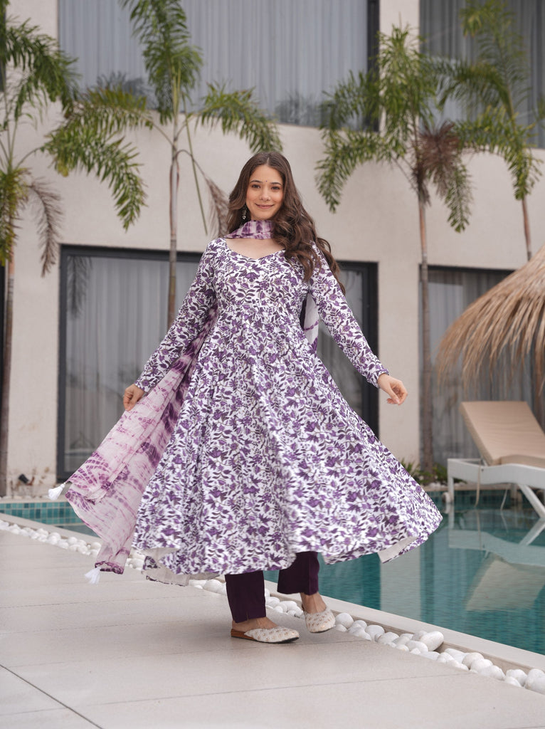 Purple Floral Printed Pure Cotton Suit Set with Faux Georgette Dupatta & Tassel Detailing ClothsVilla
