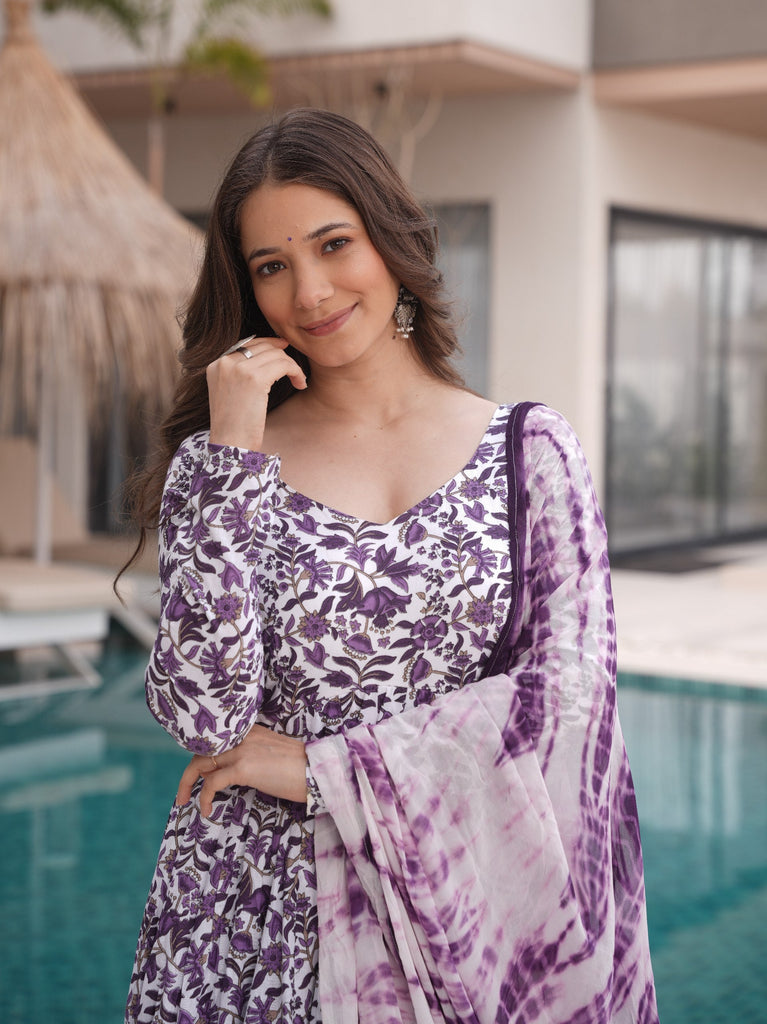 Purple Floral Printed Pure Cotton Suit Set with Faux Georgette Dupatta & Tassel Detailing ClothsVilla