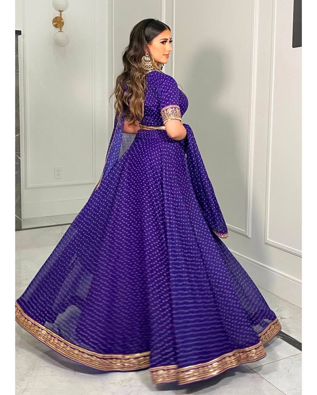 Purple Graceful Georgette Printed Lehenga Set with Zari Thread Detailing Clothsvilla